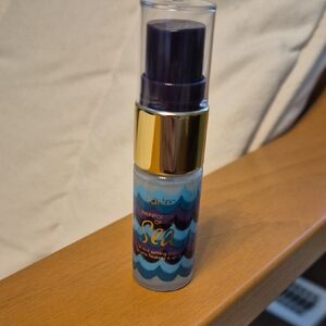Tarte Rainforest Setting Mist with Purple and Gold Accents